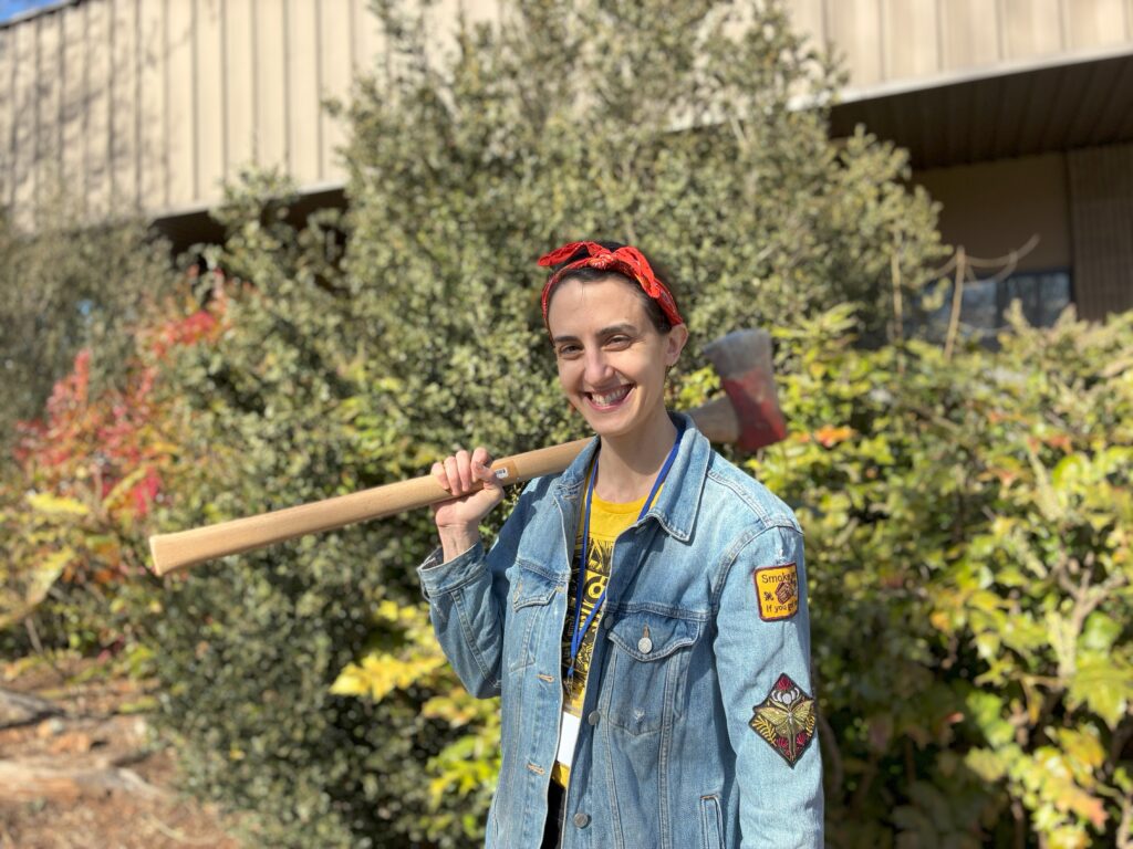 Librarian Lynn holding an axe