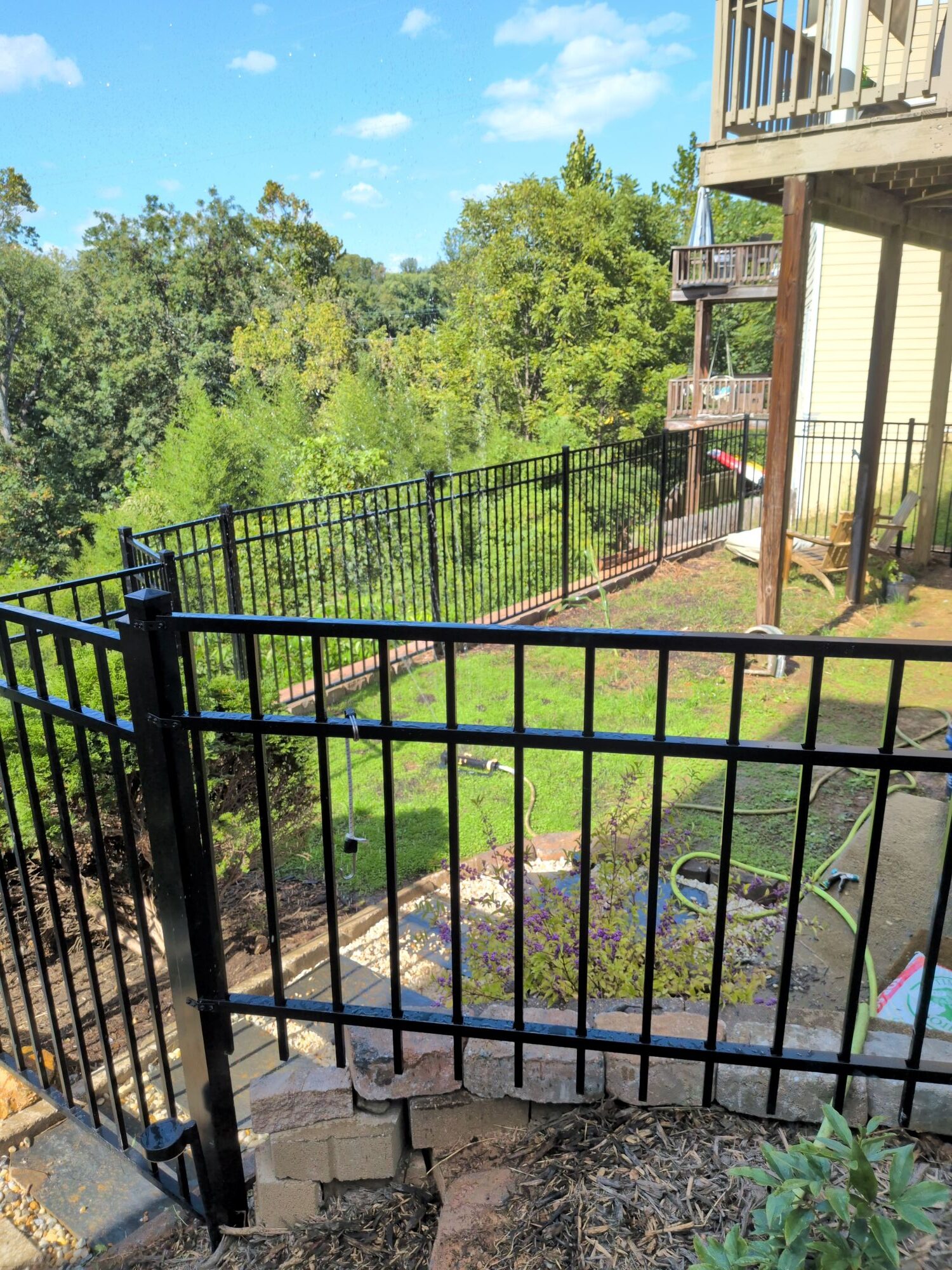 A Backyard Upgrade: DIY Aluminum Fence Installation Made Easy