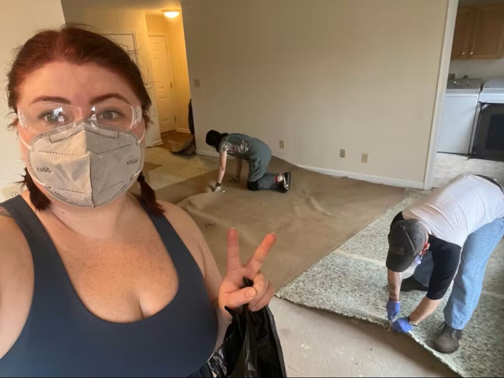 proud new homeowner with new flooring install